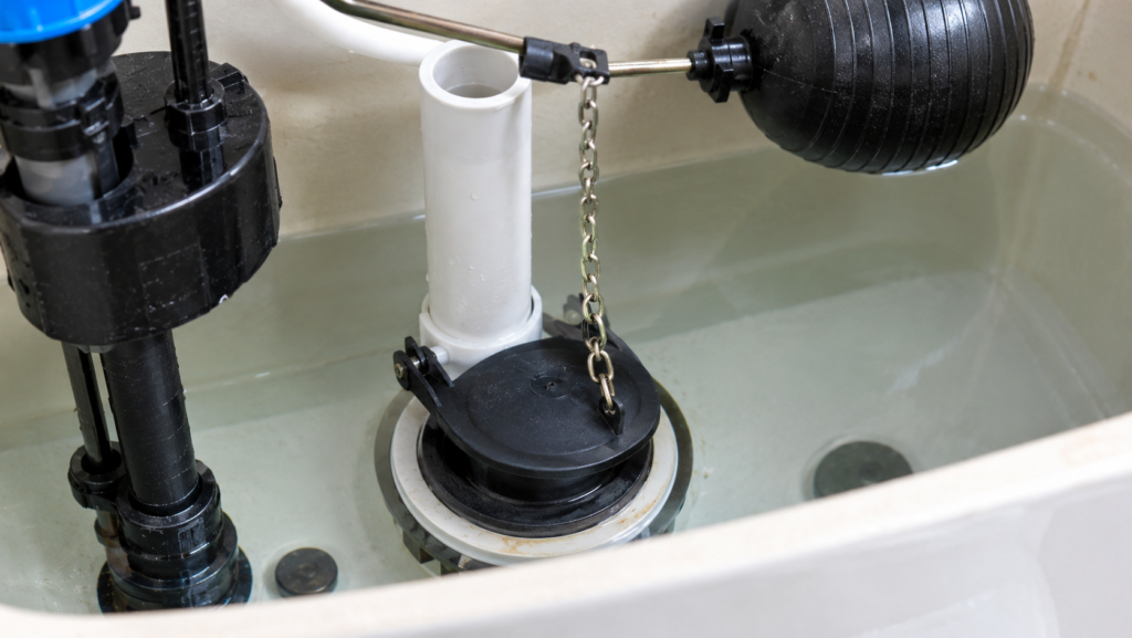 Toilet cistern flapper and chain that must close properly to prevent water from leaking into the bowl.